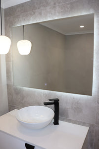 Well-lit Bathroom Vanity with Smart LED Mirror and Pendant light