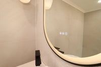  Triple Touch Buttons of Black Frame Oval Smart LED Mirror in Cream Bathroom