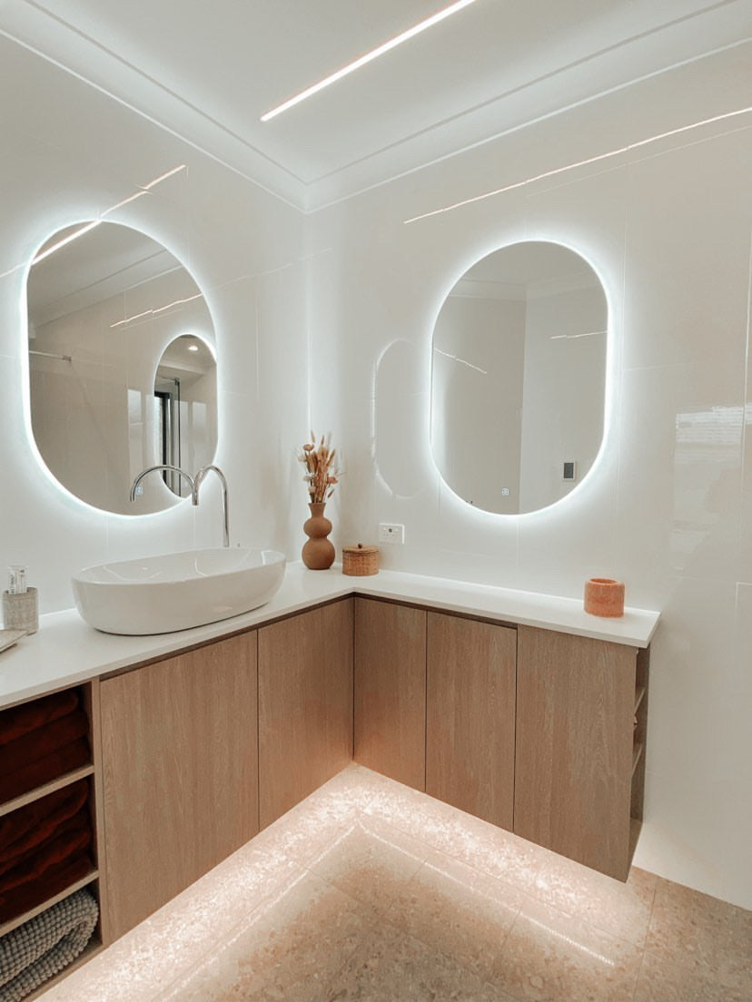 Corner Vanity with Dual Oval LED Mirrors, Floating Cabinet with Under-Lighting, and LED Lighting