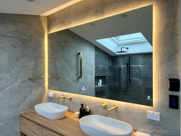 Serene Bathroom Setting with Large LED Mirror on Yellow Mode