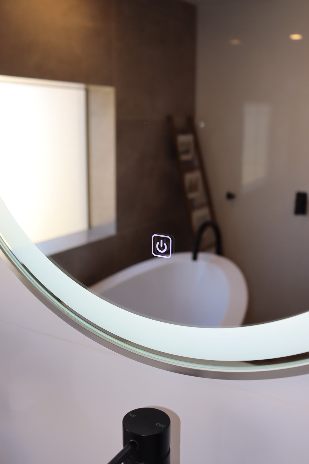 Intriguing View of the Touch Button on a Silver Frame LED Mirror